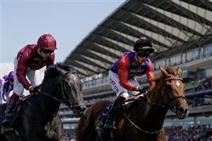 ASCOT, ENGLAND - JUNE 22: Tom Marquand riding Desert Hero (red sleeves, black cap) win The King George V Stakes on day three during Royal Ascot 2023 at Ascot Racecourse on June 22, 2023 in Ascot, England. (Photo by Alan Crowhurst/Getty Images for Ascot Racecourse)