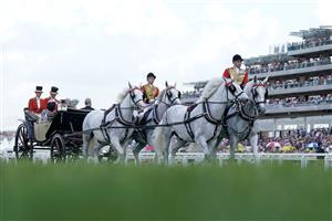 ASCOT, ENGLAND - JUNE 22: The royal procession make their way down the course on day three during Royal Ascot 2023 at Ascot Racecourse on June 22, 2023 in Ascot, England. (Photo by Alan Crowhurst/Getty Images for Ascot Racecourse)