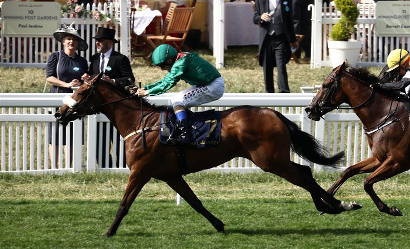 Jockey Chrids Hayes riding Tahiyra compete to win ahead of third-placed Sounds of Heaven ridden by jockey Ronan Whelan (R), in the Coronation Stakes race on the fourth day of the Royal Ascot horse racing meeting in Ascot, west of London, on June 23, 2023. (Photo by HENRY NICHOLLS / AFP) (Photo by HENRY NICHOLLS/AFP via Getty Images)