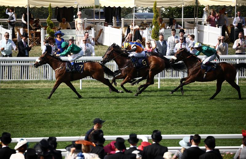 Jockey Chris Hayes riding Tahiyra (L) compete to win ahead of second-placed Remarquee ridden by Rob Hornby (R) and third-placed Sounds of Heaven ridden by jockey Ronan Whelan (C), in the Coronation Stakes race on the fourth day of the Royal Ascot horse racing meeting in Ascot, west of London, on June 23, 2023. (Photo by HENRY NICHOLLS / AFP) / "The erroneous mention[s] appearing in the metadata of this photo by HENRY NICHOLLS has been modified in AFP systems in the following manner: [Jockey Chris Hayes riding Tahiyra (L) compete to win ahead of second-placed Remarquee ridden by Rob Hornby (R) and third-placed Sounds of Heaven ridden by jockey Ronan Whelan (C)] instead of [Jockey Chrids Hayes riding Tahiyra (L) compete to win ahead of third-placed Remaruee ridden by jockey Rob Hornby, in the Coronation Stakes race on the fourth day of the Royal Ascot horse racing meeting in Ascot, west of London, on June 23, 2023.]. Please immediately remove the erroneous mention[s] from all your online services and delete it (them) from your servers. If you have been authorized by AFP to distribute it (them) to third parties, please ensure that the same actions are carried out by them. Failure to promptly comply with these instructions will entail liability on your part for any continued or post notification usage. Therefore we thank you very much for all your attention and prompt action. We are sorry for the inconvenience this notification may cause and remain at your disposal for any further information you may require." (Photo by HENRY NICHOLLS/AFP via Getty Images)