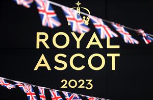 ASCOT, ENGLAND - JUNE 23: British flags fly in the wind in-front of signage during day four of Royal Ascot 2023 at Ascot Racecourse on June 23, 2023 in Ascot, England. (Photo by Alex Pantling/Getty Images)