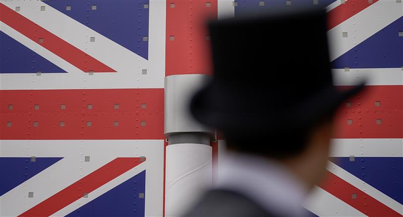ASCOT, ENGLAND - JUNE 24: A gentleman wears a top hat on day five during Royal Ascot 2023 at Ascot Racecourse on June 24, 2023 in Ascot, England. (Photo by Alan Crowhurst/Getty Images for Ascot Racecourse)