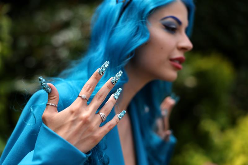 ASCOT, ENGLAND - JUNE 24: A racegoer poses for a photo during day five of Royal Ascot 2023 at Ascot Racecourse on June 24, 2023 in Ascot, England. (Photo by Alex Pantling/Getty Images)