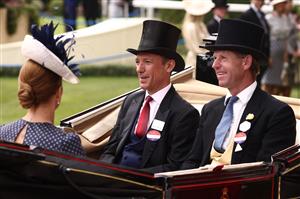 Jockey Frankie Dettori (C) and trainer Jamie Snowden (R) arrive in the parade ring in a horse-drawn carriage, part of the Royal Procession on the final day of the Royal Ascot horse racing meeting in Ascot, west of London, on June 24, 2023. (Photo by HENRY NICHOLLS / AFP) (Photo by HENRY NICHOLLS/AFP via Getty Images)