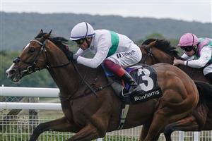 CHICHESTER, ENGLAND - AUGUST 04: Frankie Dettori riding Epictetus (white) win The Bonhams Thoroughbred Stakes from Ryan Moore and Nostrum at Goodwood Racecourse on August 04, 2023 in Chichester, England. (Photo by Alan Crowhurst/Getty Images)