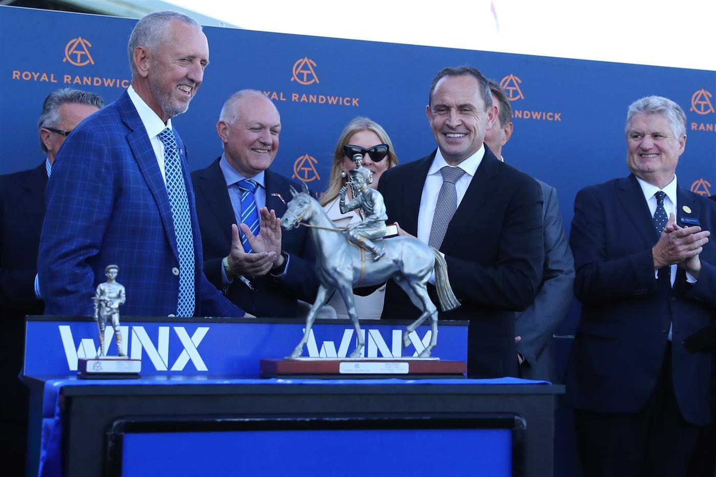 SYDNEY, AUSTRALIA - AUGUST 19: VIPs and connections celebrate winning Race 8 Winx Stakes  during "Winx Stakes Day" - Sydney Racing at Royal Randwick Racecourse on August 19, 2023 in Sydney, Australia. (Photo by Jeremy Ng/Getty Images)