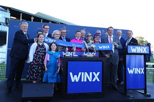 SYDNEY, AUSTRALIA - AUGUST 19: VIPs and connections celebrate winning Race 8 Winx Stakes  during "Winx Stakes Day" - Sydney Racing at Royal Randwick Racecourse on August 19, 2023 in Sydney, Australia. (Photo by Jeremy Ng/Getty Images)