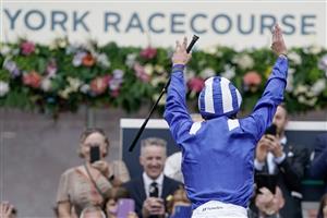 YORK, ENGLAND - AUGUST 23: Frankie Dettori leaps from his mount after riding Mostahdaf to win The Juddmonte International Stakes at York Racecourse on August 23, 2023 in York, England. (Photo by Alan Crowhurst/Getty Images)