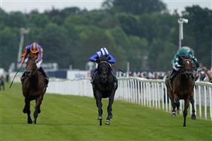 YORK, ENGLAND - AUGUST 23: Frankie Dettori riding Mostahdaf (C, blue) win The Juddmonte International Stakes at York Racecourse on August 23, 2023 in York, England. (Photo by Alan Crowhurst/Getty Images)