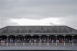 YORK, ENGLAND - AUGUST 23: Racegoers watch the action at York Racecourse on August 23, 2023 in York, England. (Photo by Alan Crowhurst/Getty Images)