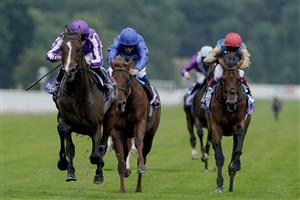 YORK, ENGLAND - AUGUST 23: Ryan Moore riding Continuous (L, purple) win The Sky Bet Great Voltigeur Stakesat York Racecourse on August 23, 2023 in York, England. (Photo by Alan Crowhurst/Getty Images)
