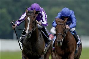 YORK, ENGLAND - AUGUST 23: Ryan Moore riding Continuous (L, purple) win The Sky Bet Great Voltigeur Stakes at York Racecourse on August 23, 2023 in York, England. (Photo by Alan Crowhurst/Getty Images)