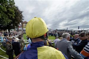 YORK, ENGLAND - AUGUST 24: Jockeys enter the parade ring at York Racecourse on August 24, 2023 in York, England. (Photo by Alan Crowhurst/Getty Images)