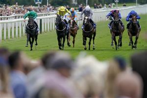 YORK, ENGLAND - AUGUST 24: Tom Marquand riding Relief Rally (L, green) win The Sky Bet Lowther Stakes at York Racecourse on August 24, 2023 in York, England. (Photo by Alan Crowhurst/Getty Images)
