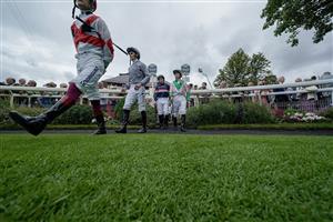 YORK, ENGLAND - AUGUST 24: Jockeys enter the parade ring at York Racecourse on August 24, 2023 in York, England. (Photo by Alan Crowhurst/Getty Images)