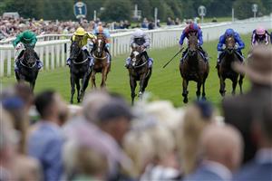 YORK, ENGLAND - AUGUST 24: Tom Marquand riding Relief Rally (L, green) win The Sky Bet Lowther Stakes at York Racecourse on August 24, 2023 in York, England. (Photo by Alan Crowhurst/Getty Images)
