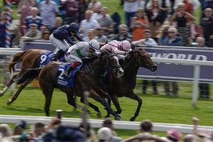 YORK, ENGLAND - AUGUST 24: James Doyle riding Warm Heart (R, pink) win The Pertemps Network Yorkshire Oaks from Frankie Dettori and Free Wind (white/green) at York Racecourse on August 24, 2023 in York, England. (Photo by Alan Crowhurst/Getty Images)