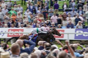 YORK, ENGLAND - AUGUST 24: James Doyle riding Warm Heart (R, pink) win The Pertemps Network Yorkshire Oaks from Frankie Dettori and Free Wind (white/green) at York Racecourse on August 24, 2023 in York, England. (Photo by Alan Crowhurst/Getty Images)