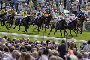 YORK, ENGLAND - AUGUST 24: James Doyle riding Warm Heart (R, pink) win The Pertemps Network Yorkshire Oaks from Frankie Dettori and Free Wind (white/green) at York Racecourse on August 24, 2023 in York, England. (Photo by Alan Crowhurst/Getty Images)