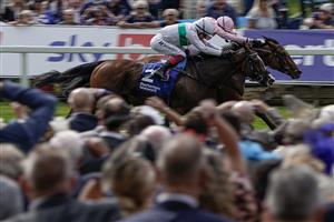 YORK, ENGLAND - AUGUST 24: James Doyle riding Warm Heart (R, pink) win The Pertemps Network Yorkshire Oaks from Frankie Dettori and Free Wind (white/green) at York Racecourse on August 24, 2023 in York, England. (Photo by Alan Crowhurst/Getty Images)