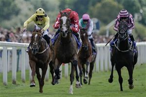 YORK, ENGLAND - AUGUST 26: Oisin Orr riding Spirit Dancer (red) win The Sky Bet And Symphony Group Strensall Stakes at York Racecourse on August 26, 2023 in York, England. (Photo by Alan Crowhurst/Getty Images)