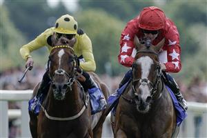 YORK, ENGLAND - AUGUST 26: Oisin Orr riding Spirit Dancer (red) win The Sky Bet And Symphony Group Strensall Stakes at York Racecourse on August 26, 2023 in York, England. (Photo by Alan Crowhurst/Getty Images)