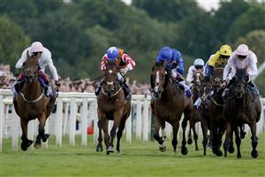 YORK, ENGLAND - AUGUST 26: Frankie Dettori riding Absurde (L, pink) win The Sky Bet Ebor Handicap at York Racecourse on August 26, 2023 in York, England. (Photo by Alan Crowhurst/Getty Images)