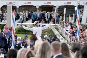 YORK, ENGLAND - AUGUST 26: Frankie Dettori celebrates after riding Absurde to win The Sky Bet Ebor Handicap at York Racecourse on August 26, 2023 in York, England. (Photo by Alan Crowhurst/Getty Images)