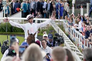 YORK, ENGLAND - AUGUST 26: Frankie Dettori celebrates after riding Absurde to win The Sky Bet Ebor Handicap at York Racecourse on August 26, 2023 in York, England. (Photo by Alan Crowhurst/Getty Images)