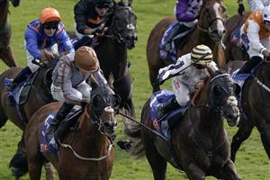 YORK, ENGLAND - AUGUST 26: Danny Tudhope riding Summerghand (L, brown cap) and Hollie Doyle riding Albasheer (yellow cap) dead heat for first place in The Sky Bet Constantine Handicap at York Racecourse on August 26, 2023 in York, England. (Photo by Alan Crowhurst/Getty Images)