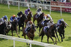 YORK, ENGLAND - AUGUST 26: Danny Tudhope riding Summerghand (L, brown cap) and Hollie Doyle riding Albasheer (yellow cap) dead heat for first place in The Sky Bet Constantine Handicap at York Racecourse on August 26, 2023 in York, England. (Photo by Alan Crowhurst/Getty Images)
