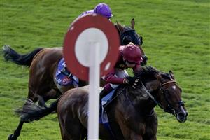 YORK, ENGLAND - AUGUST 26: Oisin Murphy riding Middle Earth (maroon) win The Sky Bet Melrose Handicap at York Racecourse on August 26, 2023 in York, England. (Photo by Alan Crowhurst/Getty Images)
