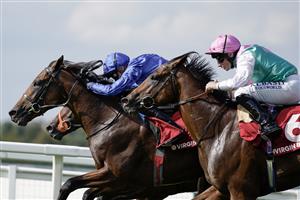 ESHER, ENGLAND - SEPTEMBER 02: James Doyle riding Aablan (blue) win The Virgin Bet Solario Stakes at Sandown Park Racecourse on September 02, 2023 in Esher, England. (Photo by Alan Crowhurst/Getty Images)