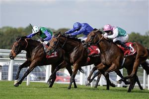 ESHER, ENGLAND - SEPTEMBER 02: James Doyle riding Aablan (blue) win The Virgin Bet Solario Stakes at Sandown Park Racecourse on September 02, 2023 in Esher, England. (Photo by Alan Crowhurst/Getty Images)