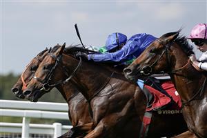ESHER, ENGLAND - SEPTEMBER 02: James Doyle riding Aablan (blue) win The Virgin Bet Solario Stakes at Sandown Park Racecourse on September 02, 2023 in Esher, England. (Photo by Alan Crowhurst/Getty Images)