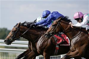 ESHER, ENGLAND - SEPTEMBER 02: James Doyle riding Aablan (blue) win The Virgin Bet Solario Stakes at Sandown Park Racecourse on September 02, 2023 in Esher, England. (Photo by Alan Crowhurst/Getty Images)