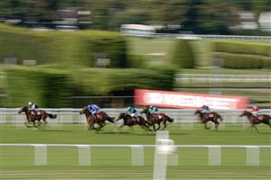 ESHER, ENGLAND - SEPTEMBER 02: Ryan Moore riding Classical Song (L) win The Virgin Bet Maiden Fillies