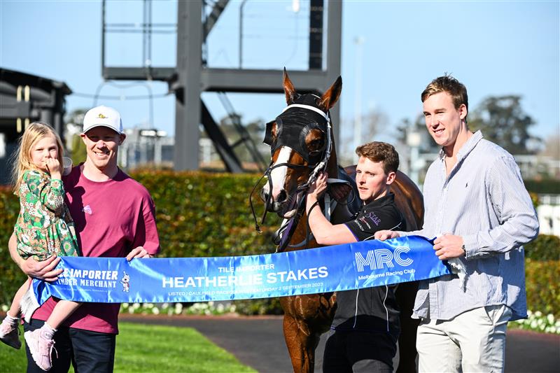 MELBOURNE, AUSTRALIA - SEPTEMBER 02: Winning connections Jack Riewoldt and daughter Poppy Riewoldt and Tom Lynch pose after Soulcombe won Race 6, the Tile Importer Heatherlie Stakes, during Melbourne Racing at Caulfield Racecourse on September 02, 2023 in Melbourne, Australia. (Photo by Vince Caligiuri/Getty Images)
