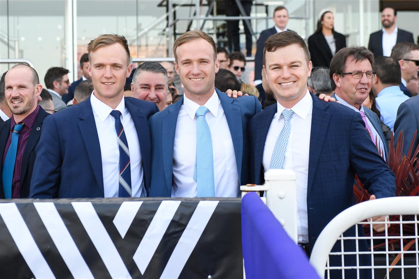 MELBOURNE, AUSTRALIA - SEPTEMBER 02: (L-R) Trainers Will Hayes, JD Hayes and Ben Hayes are seen after Rheinberg won Race 2, the Changing Places Real Estate Handicap,  during Melbourne Racing at Caulfield Racecourse on September 02, 2023 in Melbourne, Australia. (Photo by Vince Caligiuri/Getty Images)