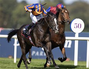 DUBLIN, IRELAND - SEPTEMBER 09: Ryan Moore riding Auguste Rodin (orange/blue) win The Royal Bahrain Irish Champion Stakes from Seamie Heffernan and Luxembourg (red/blue) at Leopardstown Racecourse on September 09, 2023 in Dublin, Ireland. (Photo by Alan Crowhurst/Getty Images)