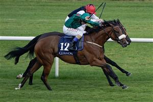 DUBLIN, IRELAND - SEPTEMBER 09: Chris Hayes riding Tahiyra (green) win The Coolmore America
