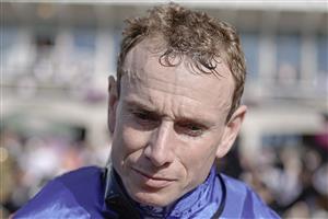 DUBLIN, IRELAND - SEPTEMBER 09: Ryan Moore after riding Auguste Rodin to win The Royal Bahrain Irish Champion Stakes at Leopardstown Racecourse on September 09, 2023 in Dublin, Ireland. (Photo by Alan Crowhurst/Getty Images)