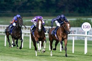 DUBLIN, IRELAND - SEPTEMBER 09: Ryan Moore riding Diego Velazquez (purple/white) win The KPMG Champions Juvenile Stakes from Seamie Heffernan and Capulet (dark blue) at Leopardstown Racecourse on September 09, 2023 in Dublin, Ireland. (Photo by Alan Crowhurst/Getty Images)