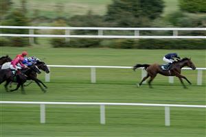 DUBLIN, IRELAND - SEPTEMBER 09: Ryan Moore riding Adelaide River win The Paddy Power Stakes at Leopardstown Racecourse on September 09, 2023 in Dublin, Ireland. (Photo by Alan Crowhurst/Getty Images)
