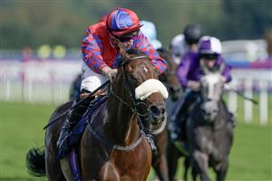 DONCASTER, ENGLAND - SEPTEMBER 15: Tom Marquand riding Big Evs (red/blue) win The Carlsberg Danish Pilsner Flying Childers Stakes at Doncaster Racecourse on September 15, 2023 in Doncaster, England. (Photo by Alan Crowhurst/Getty Images)