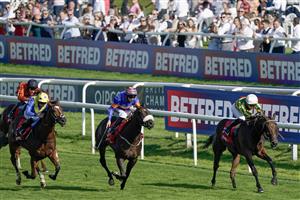 DONCASTER, ENGLAND - SEPTEMBER 15: Mark Winn riding Legendary Day (R) win The Betfred Mallard Handicap at Doncaster Racecourse on September 15, 2023 in Doncaster, England. (Photo by Alan Crowhurst/Getty Images)