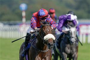 DONCASTER, ENGLAND - SEPTEMBER 15: Tom Marquand riding Big Evs (red/blue) win The Carlsberg Danish Pilsner Flying Childers Stakes at Doncaster Racecourse on September 15, 2023 in Doncaster, England. (Photo by Alan Crowhurst/Getty Images)