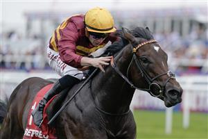 DONCASTER, ENGLAND - SEPTEMBER 16: Tom Marquand riding Iberian win The Betfred Champagne Stakes at Doncaster Racecourse on September 16, 2023 in Doncaster, England. (Photo by Alan Crowhurst/Getty Images)