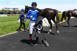 SYDNEY, AUSTRALIA - OCTOBER 14: Zac Lloyd riding Sequestered wins Race 2 World Pool during Sydney Racing - TAB Everest Day at Royal Randwick Racecourse on October 14, 2023 in Sydney, Australia. (Photo by Jeremy Ng/Getty Images)
