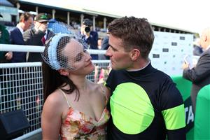 SYDNEY, AUSTRALIA - OCTOBER 14: Sam Clipperton celebrates with his wife Morgan Meyer-Clipperton after winning Race 7 The TAB Everest during Sydney Racing - TAB Everest Day at Royal Randwick Racecourse on October 14, 2023 in Sydney, Australia. (Photo by Jeremy Ng/Getty Images)